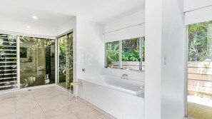 Bathtub, hair dryer, towels