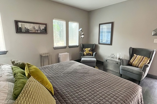 Bedroom with King bed and seating area