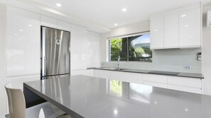 Fridge, microwave, oven, stovetop - Exquisite Penthouse with views to Laguna Bay - Unit 3 Taralla 18 Edgar Bennett Avenue (Noosa Heads)
