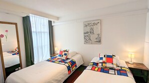 2 dormitorios, tabla de planchar con plancha, wifi gratis y ropa de cama