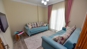 Appartement, 1 chambre | Coin séjour
