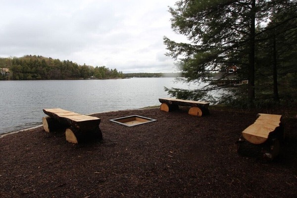 fire pit beside large boathouse