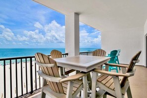 Outdoor dining - The Palms 602 | Updated 3BR Beach Front OBA Condo! (Orange Beach)
