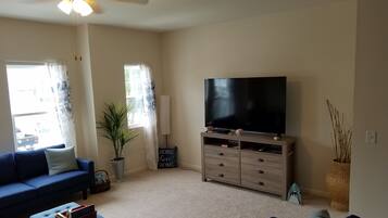 Casa família | Área de estar | TV de tela plana