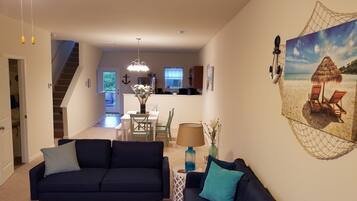 Casa família | Área de estar | TV de tela plana