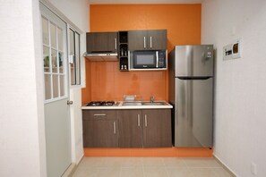 Fridge, microwave, stovetop, coffee/tea maker