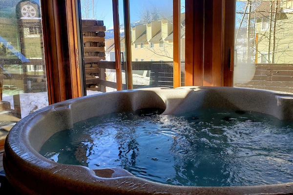 The 4 person hot tub is 50 feet away