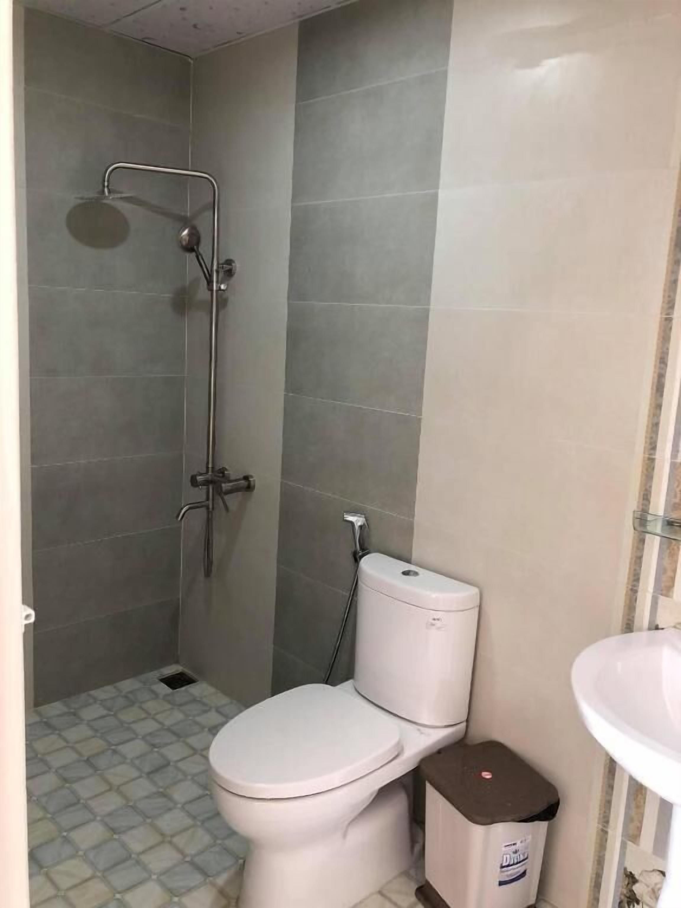 Shower, slippers, soap, shampoo