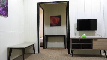 Homestay - Lavender | Living area | Flat-screen TV