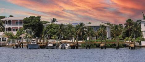 A waterfront property with a dock, boats, and a building with a sign reading "DAFFORD'S".