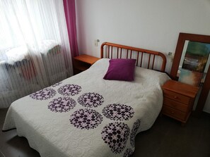 2 bedrooms, iron/ironing board, travel crib, bed sheets