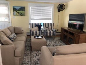 Smart TV, fireplace, foosball, books