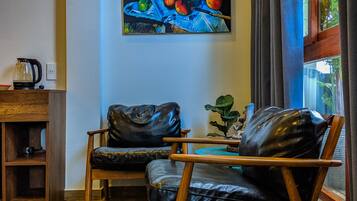 Deluxe Family Room | Living area | 50-inch flat-screen TV with premium channels, TV