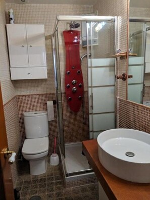 Hair dryer, towels, soap, shampoo