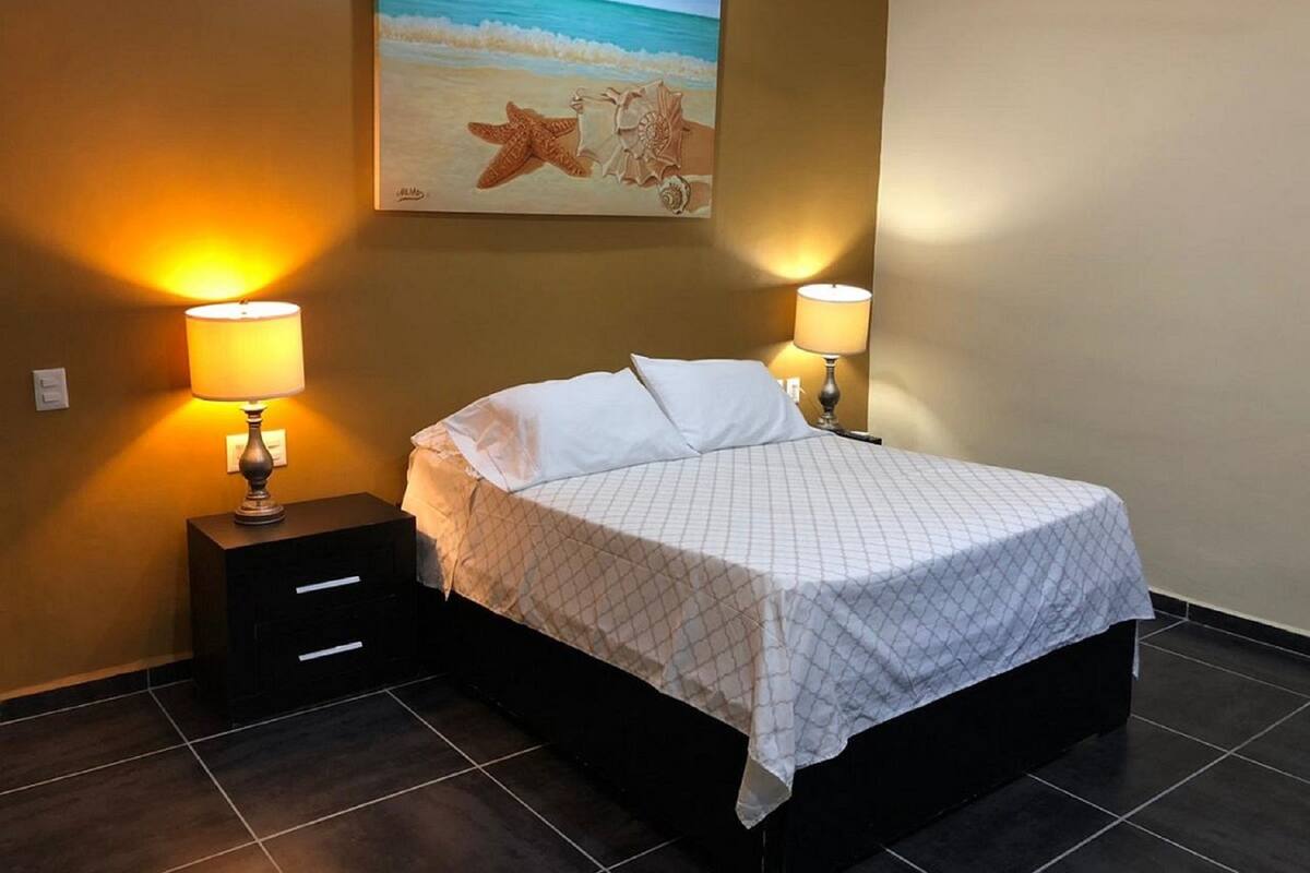 Deluxe Quadruple Room, 1 Bedroom | Premium bedding, down comforters, blackout drapes