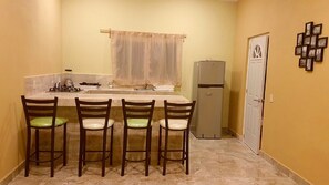 Family Bungalow | Private kitchen | Cleaning supplies - Hotelito Mar Azul (San Francisco)
