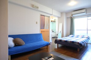 2c Standard Double Room | Living area | Flat-screen TV