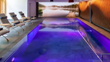 Indoor pool, open 7:00 AM to 8:00 PM, pool umbrellas, pool loungers