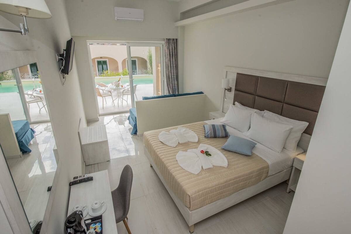 Suite junior (Shared Pool) | Caja de seguridad en la habitación, wifi gratis y ropa de cama