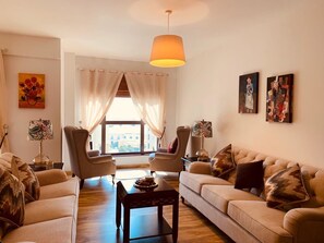 Appartement Luxe, 4 chambres | Coin séjour