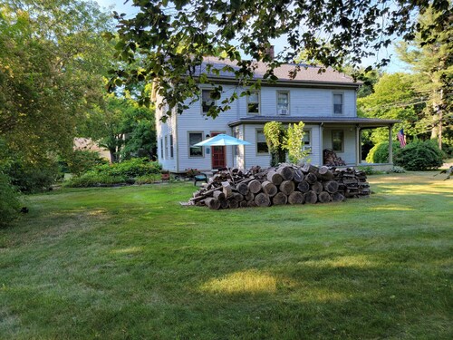 Historic Madison Home on lovely 1.2 acre setting and 5 minutes to private beach.