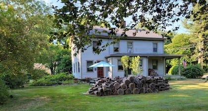 Historic Madison Home on lovely 1.2 acre setting and 5 minutes to private beach.