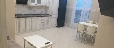 Apartment, 2 Bedrooms | Living room | Flat-screen TV