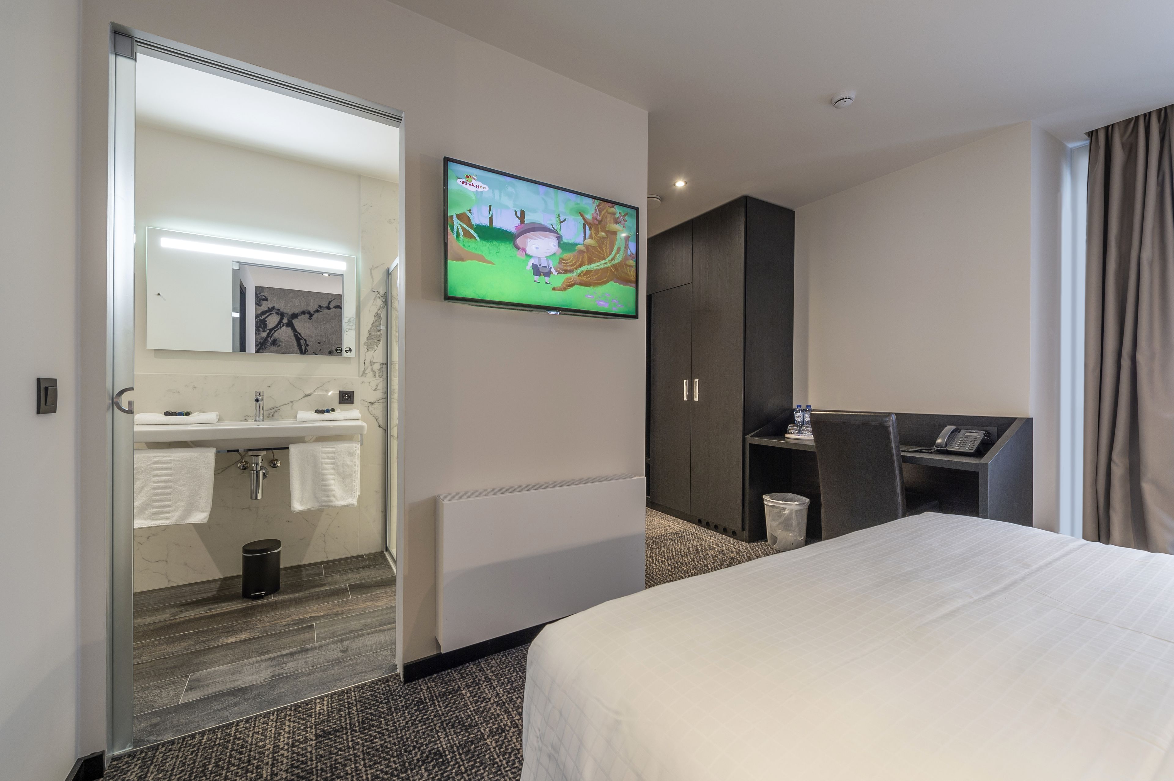 superior quadruple room | premium bedding, minibar, desk, soundproofing