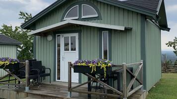 Standaard huisje, uitzicht op golfbaan | Terras
