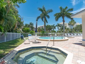 A heated pool, sun loungers