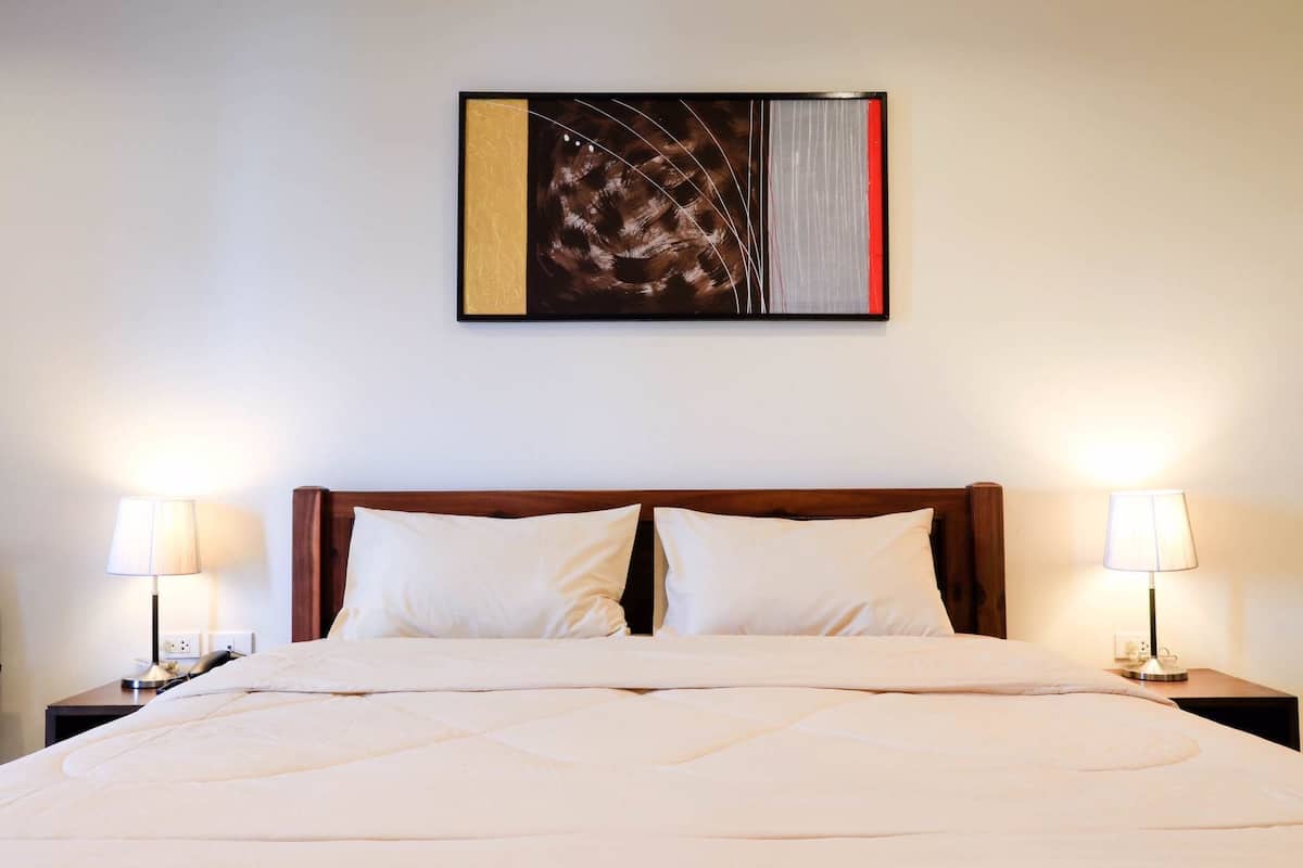 Deluxe King Bed with Balcony | Blackout curtains, free WiFi, bed sheets