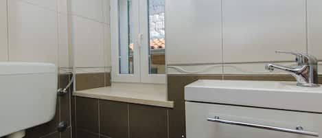 Bathroom | Hair dryer, towels