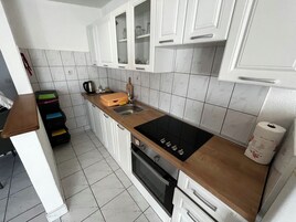 Apartment (A1) | Private kitchen | Mini-fridge, electric kettle