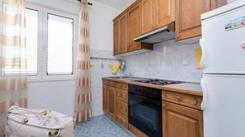 Appartamento (A1) | Cucina privata | Frigorifero, forno, piano cottura, macchina per caffè espresso