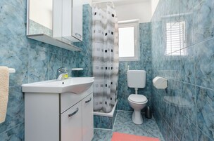 Apartamento (A1) | Banheiro | Chuveiro, secador de cabelo