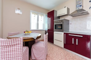 Apartment (A2) | Private kitchen | Fridge, oven, stovetop, dishwasher