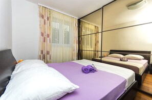 Fer et planche à repasser, Wi-Fi gratuit, draps fournis