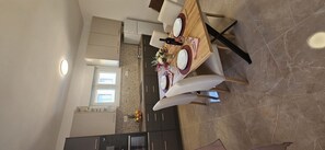 Apartment (A1) | Private kitchen | Fridge, microwave, oven, stovetop