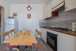Apartment (A3) | Private kitchen | Fridge, oven, stovetop, espresso maker