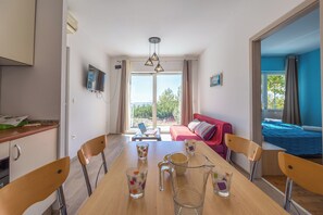 Appartamento (A3) | Cucina privata | Frigorifero, forno, piano cottura, macchina per caffè espresso