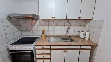 Căn hộ (A1) | Bếp riêng | Tủ lạnh, lò vi sóng, bếp nấu, dụng cụ pha cà phê/trà