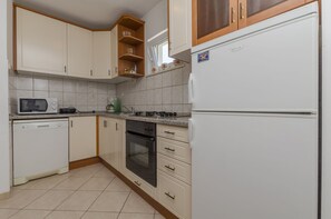 Apartment (A1) | Private kitchen - Apartments Tonko (Postira)