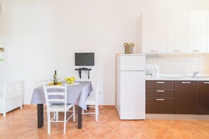 Apartment (A4) | Private kitchen | Fridge, stovetop, espresso maker, electric kettle