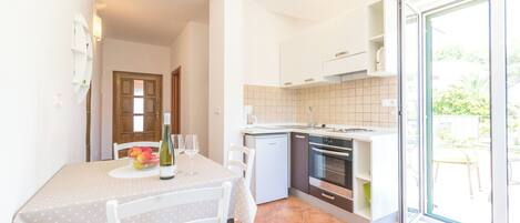 Apartment (A5) | Private kitchen | Fridge, stovetop, espresso maker, electric kettle