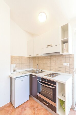 Apartment (A5) | Private kitchen | Fridge, stovetop, espresso maker, electric kettle