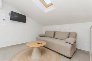 Appartement (A2) | Coin séjour | Tél�évision