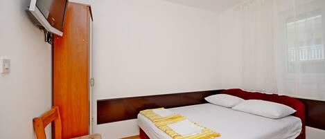 Studio (A6) | Een strijkplank/strijkijzer