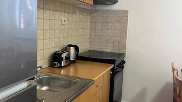 Apartment (A1) | Private kitchen | Fridge, microwave, electric kettle, toaster