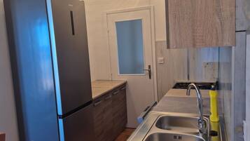 Apartment (A2) | Private kitchen | Fridge, oven, stovetop, dishwasher