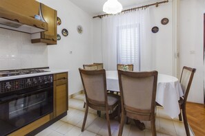 Apartment (A2) | Private kitchen | Fridge, microwave, oven, stovetop